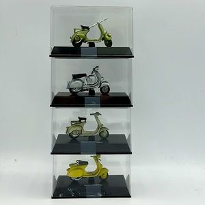 4 Collectible miniature Vespa’s. (SKU 221)